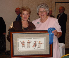 Pat and Judy with auction piece.